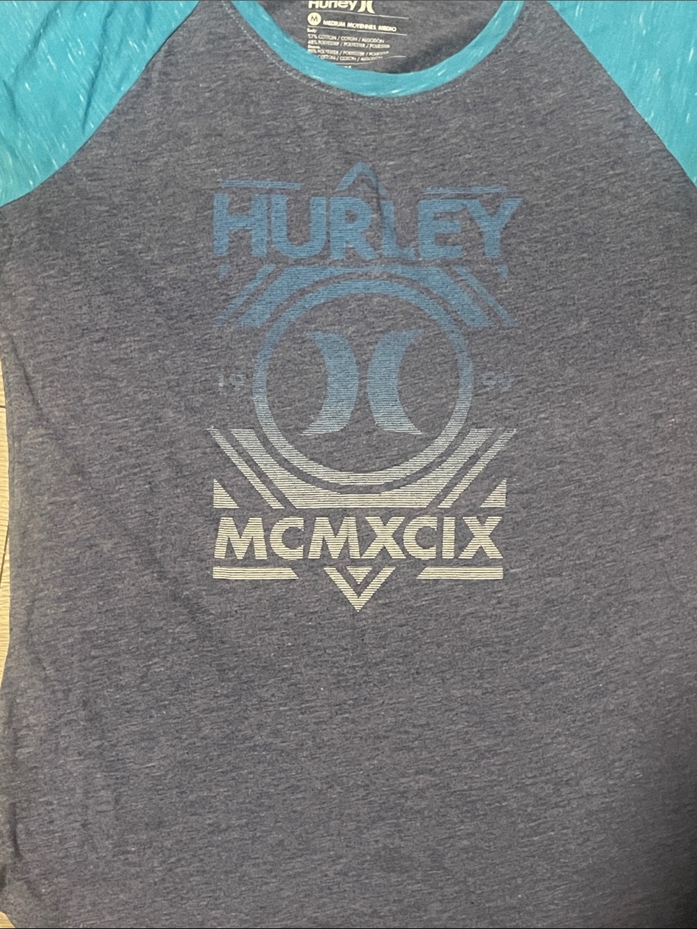 Quarter sleeve/ half sleeve Hurley top size medium